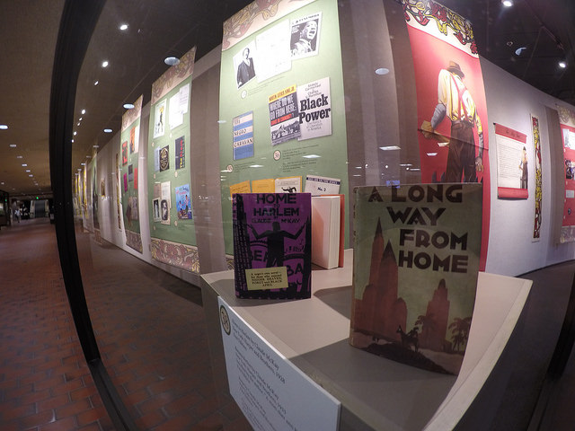 Photo of books and posters from the Bibliophilia exhibit at Hennepin Gallery