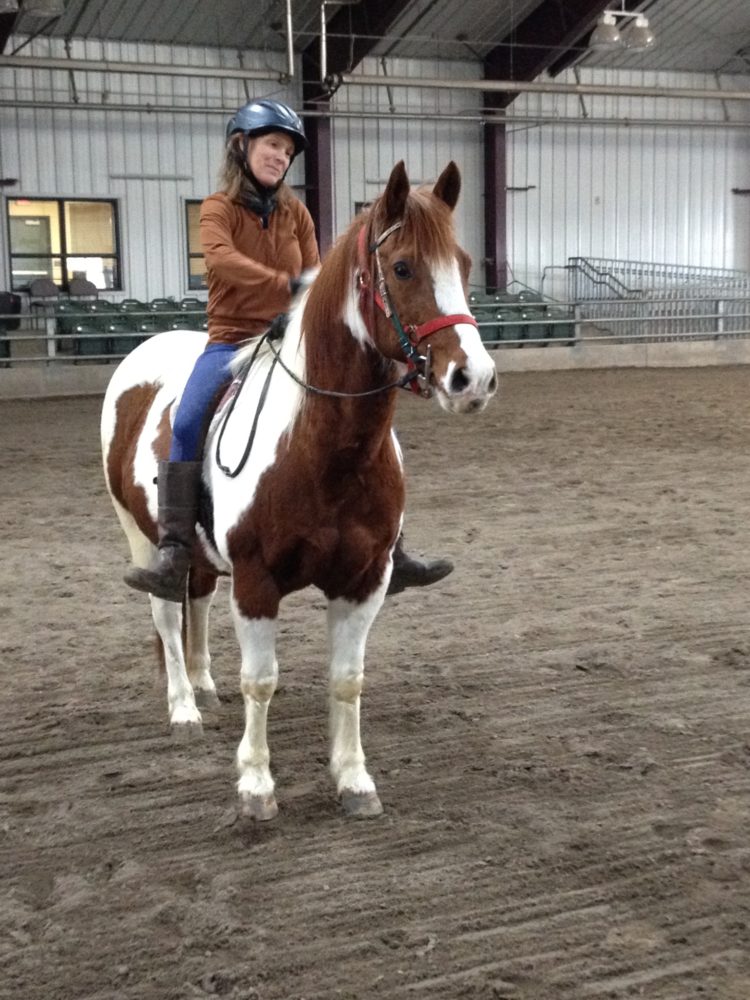 picture of woman on horse