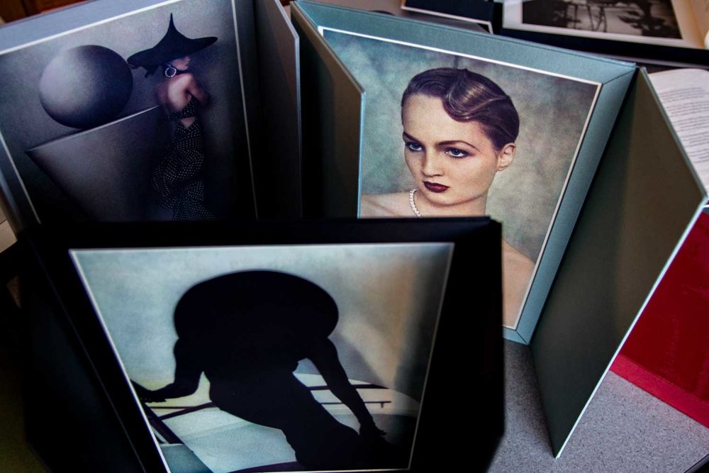 Photo of three images from 21st Editions collection.