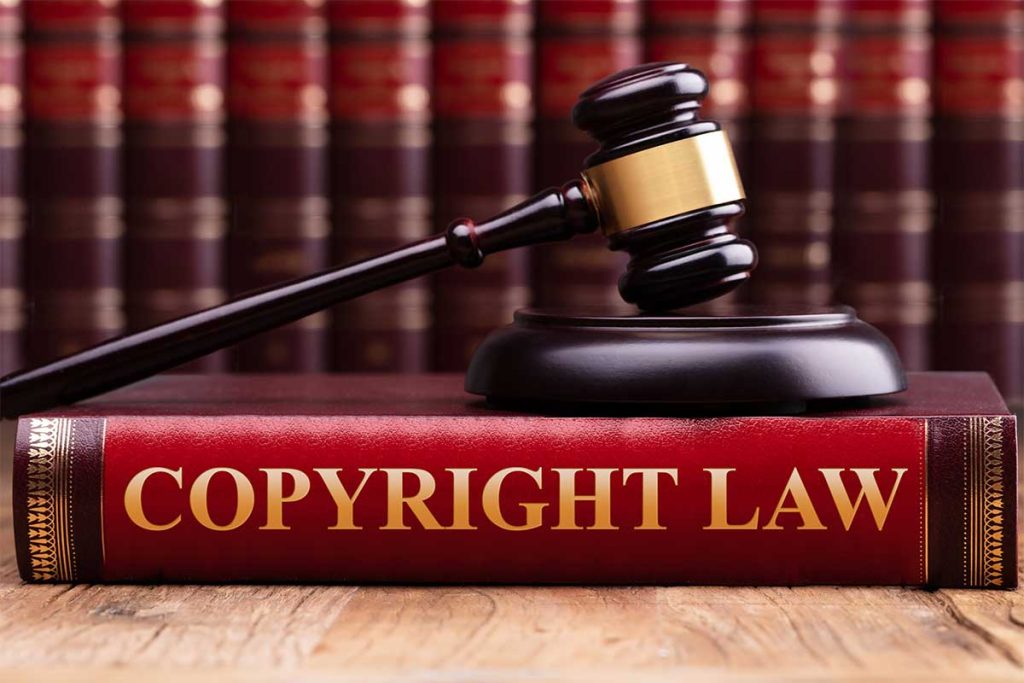 Copyright Law image with law books.