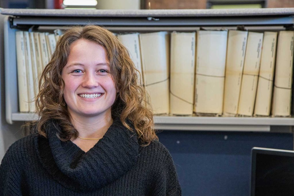 Data Analyst Kate Knowles parlays physical maps used by the U. S. Census into digital Shapefiles.