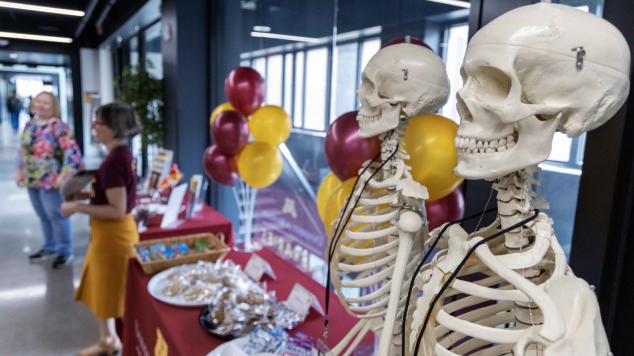 230921_awc_HSL Open House_203 copy Skeletons adorn the HSL table at the open house.