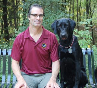André Nault with Pogo the dog