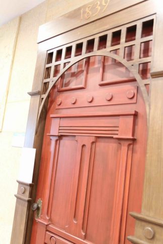A red door from a Penumbra Theatre stage set.