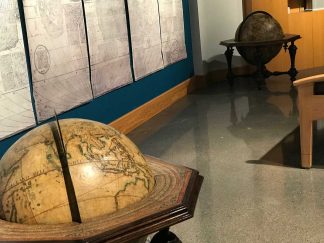 Terrestrial and celestial globes created in 1696 and now part of the James Ford Bell Library collection.