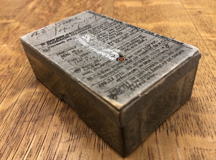 Cardboard box that was used to transport the stone. Handwritten notes on the top of the box detail who had the stone between 1927 and 1939.