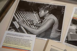 A skilled technician soldering circuit boards in the Control Data Corporation's Northside Plant in Minneapolis, 1968.