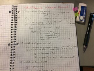 picture of eraser and pen and notebook
