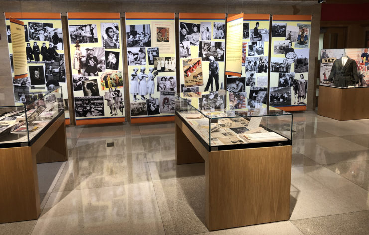 Snapshot of exhibit gallery with banners and exhibit cases