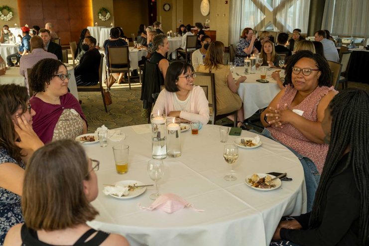 Minnesota Institute participants conversing at the opening reception.