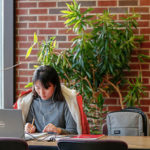 Studying in Magrath Library