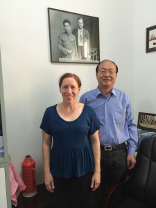 The author with Mr Zhangdao Sun, general secretary of the Hangzhou YMCA in his office, in front of a 1942 photo of American YMCA General Secretary Eugene Barnett with Zhou Enlai, Communist leader and the first Premier of the People’s Republic of China. 