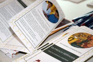 pamphlets from the Bio-Medical Library that explain its outreach program.
