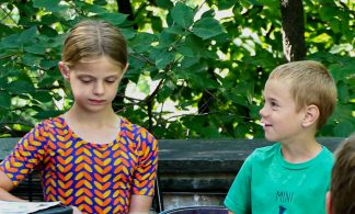 Two children listening to StoryTime at Andersen Horticultural Library