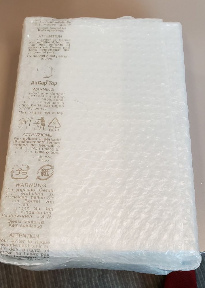 Book wrapped in bubble wrap.