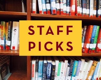 A bookshelf at Walter Library with overlaid text that reads "Staff Picks"