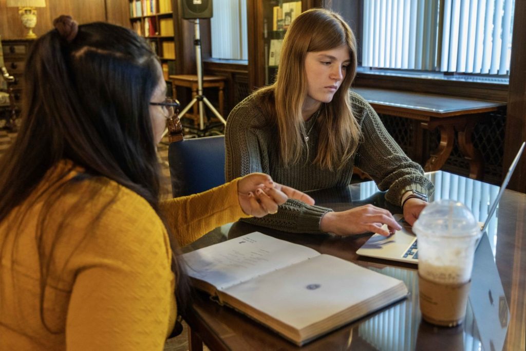 Abby Zumbrunnen and Anupama Rao, two peer research consultants, pose for a candid portrait at Walter Library on Friday, Sept. 22, 2023. (Photo/Adria Carpenter)