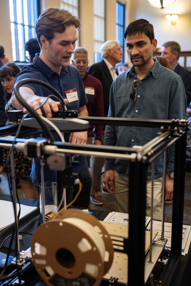 Thomas Mahota explains his concept for AnyPrint, which integrates FDM 3D printing, scanning technology, and non-planar printing techniques into a new kind of conformal 3D printer, during the Minimum Viable Product Challenge for Founder's Day at Walter Library on Wednesday, May 8, 2024. (Photo/Adria Carpenter)