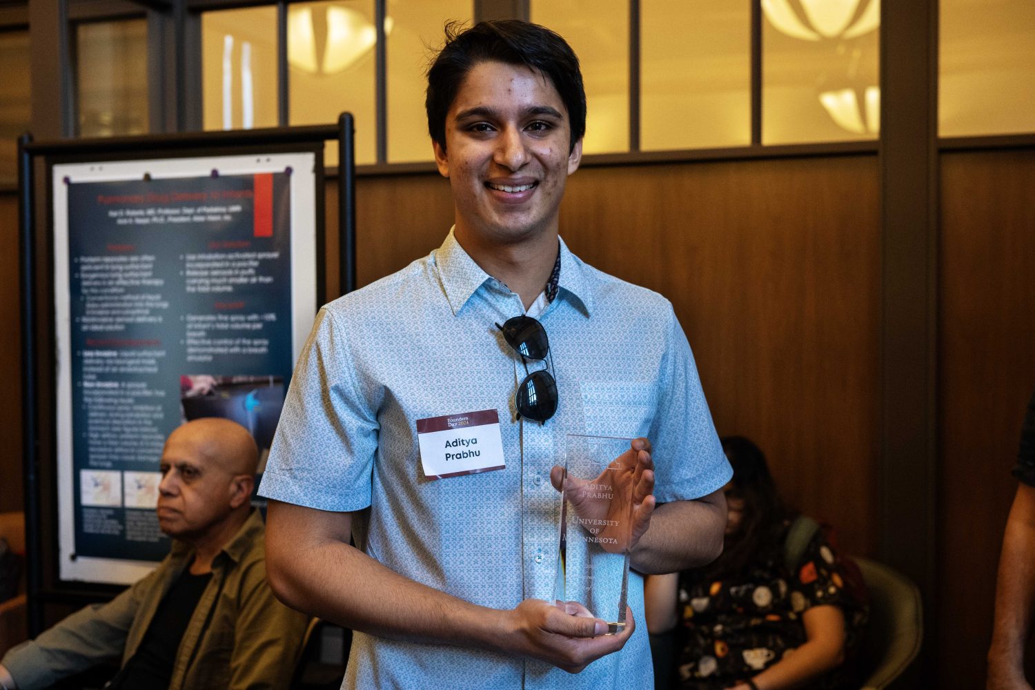 Aditya Prabhu poses with his award for Student Entrepreneur of the Year during Founder's Day at Walter Library on Wednesday, May 8, 2024. (Photo/Adria Carpenter)