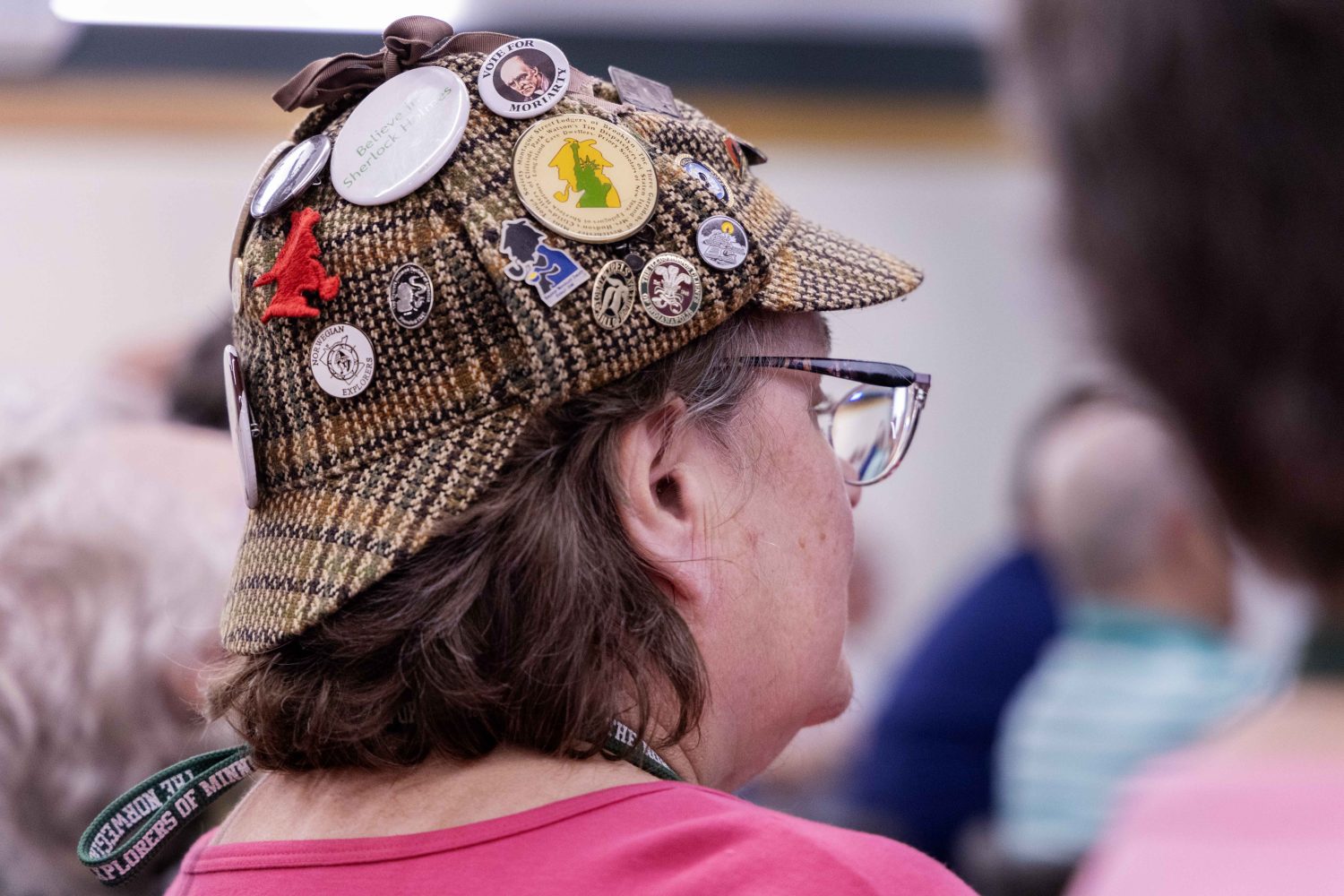 An attendee with a deerskin cap listens to speakers at the "Sherlock Holmes @ 50" conference, celebrating the 50th anniversary of the Sherlock Holmes Collections at the University of Minnesota Libraries, on Friday, July 26, 2024. (Photo/Adria Carpenter)