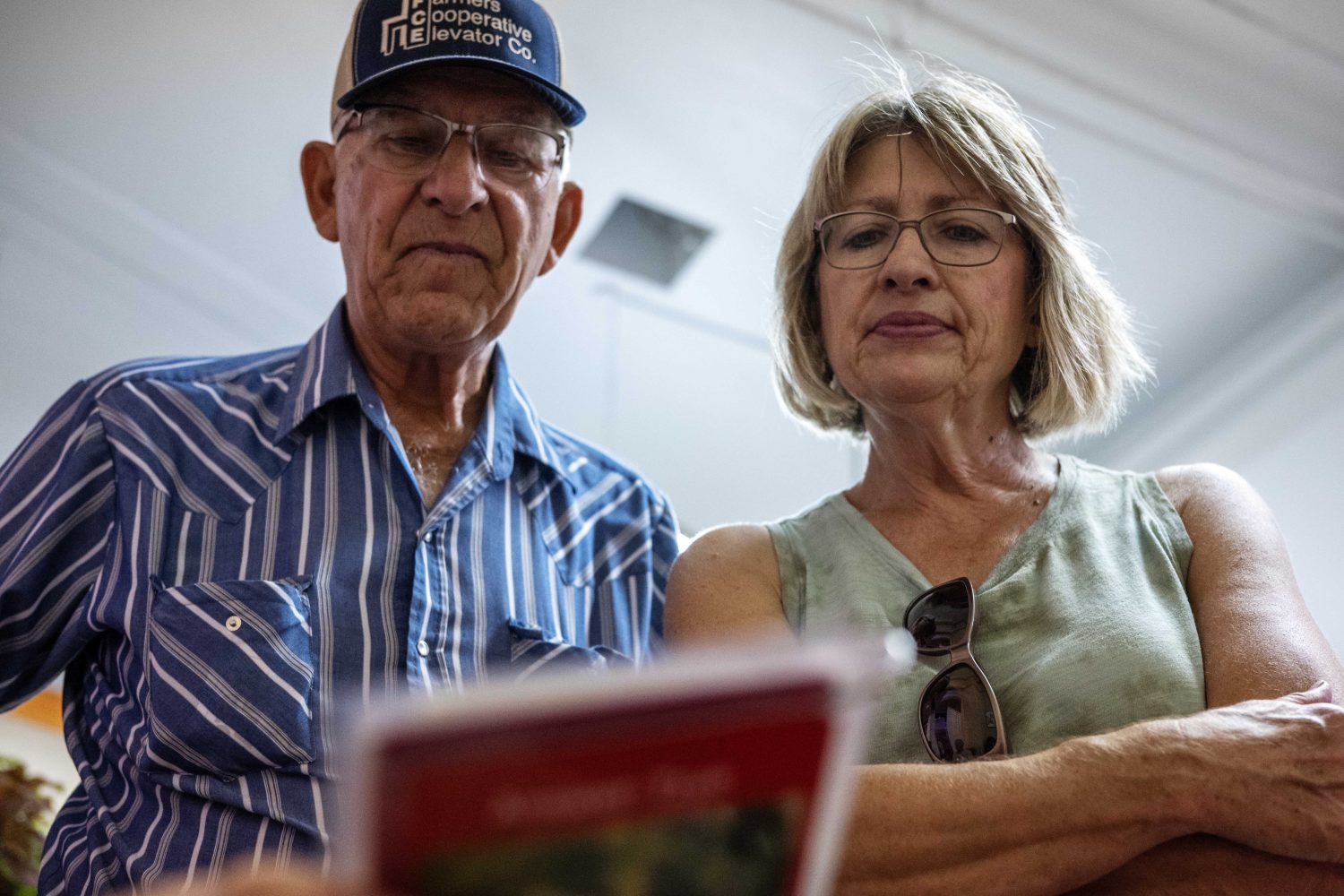 Attendees answer trivia questions at the Andersen Horticultural Library's booth at the Minnesota State Fair on Thursday, August 29, 2024. (Photo/Adria Carpenter)