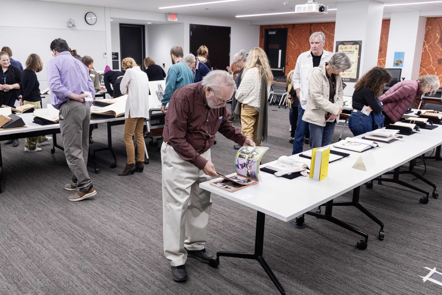 Attendees examine materials from the Wangensteen Historical Library's exhibit "Disembodied Reembodied," on Thursday, October 24, 2024. (Photo/Adria Carpenter)