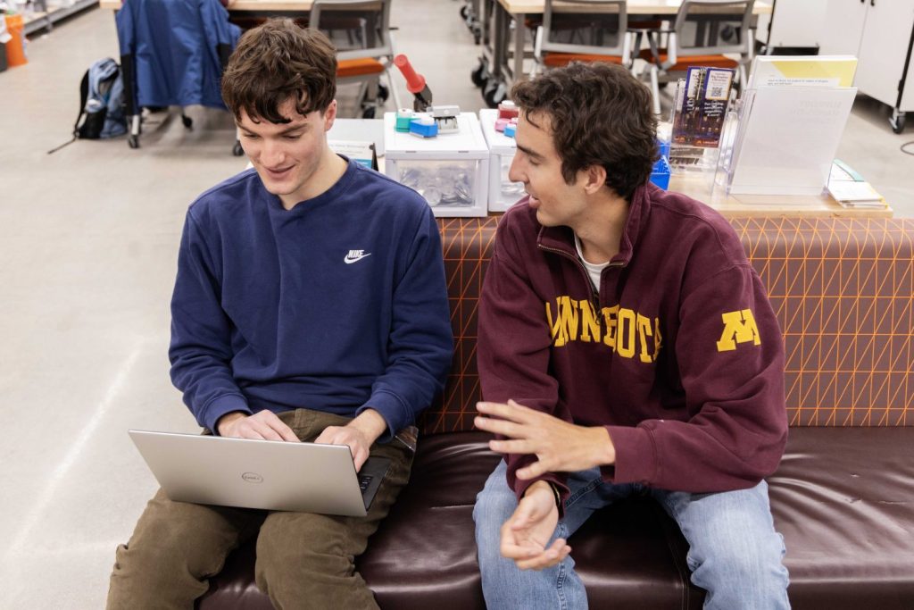 Outstanding Student Library Employee Joseph Stoll helps a student on their project in the HSL Makerspace on Wednesday, April 2, 2025. (Photo/Adria Carpenter)