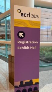Directional sign from ACRL conference to exhibit hall.