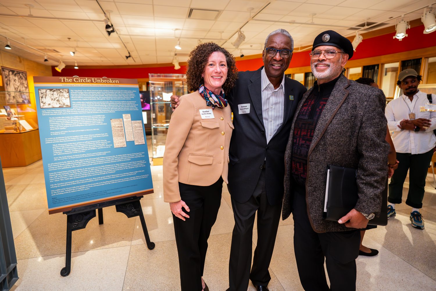Attendees walk through "The Circle Unbroken," an exhibit celebrating the 40th anniversary of the Givens Collection. (Photo/Craig Bares)