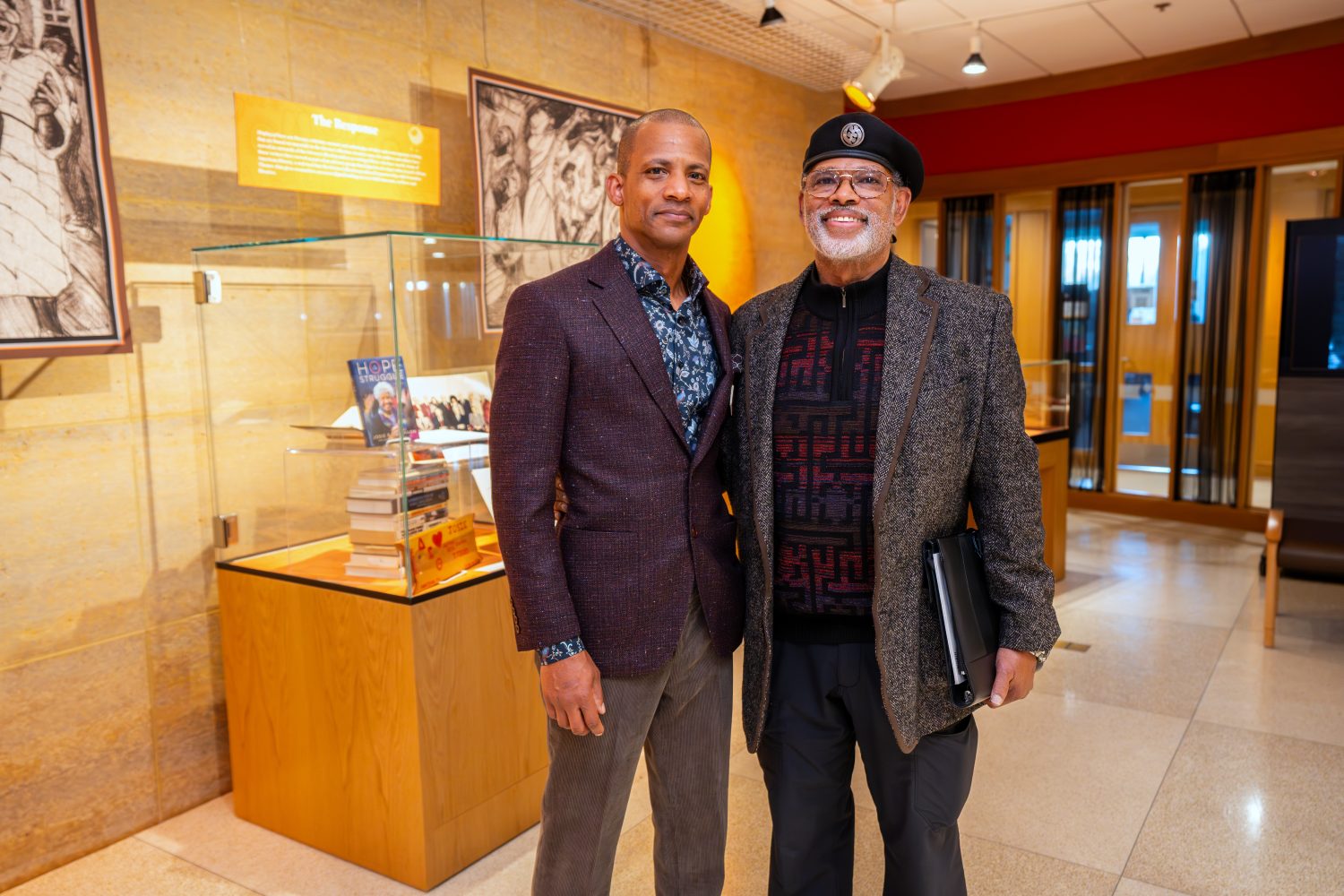 Davu Seru, curator of the Givens Collection, and Dr. John Wright, founder of the collection, pose for a portrait during the exhibit, "The Circle Unbroken." (Photo/Craig Bares)