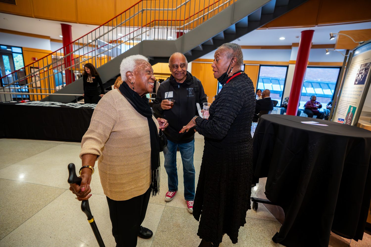 Attendees walk through "The Circle Unbroken," an exhibit celebrating the 40th anniversary of the Givens Collection. (Photo/Craig Bares)