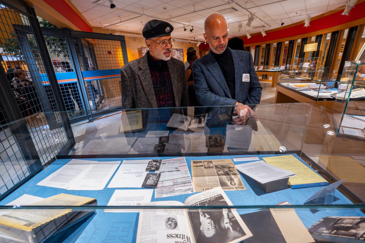 Attendees walk through "The Circle Unbroken," an exhibit celebrating the 40th anniversary of the Givens Collection. (Photo/Craig Bares)