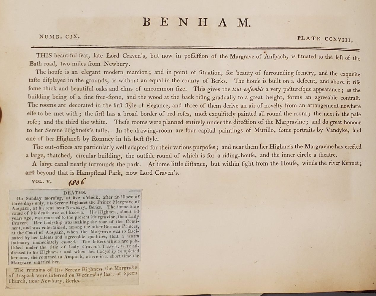 Image of a page with glued on clipping.