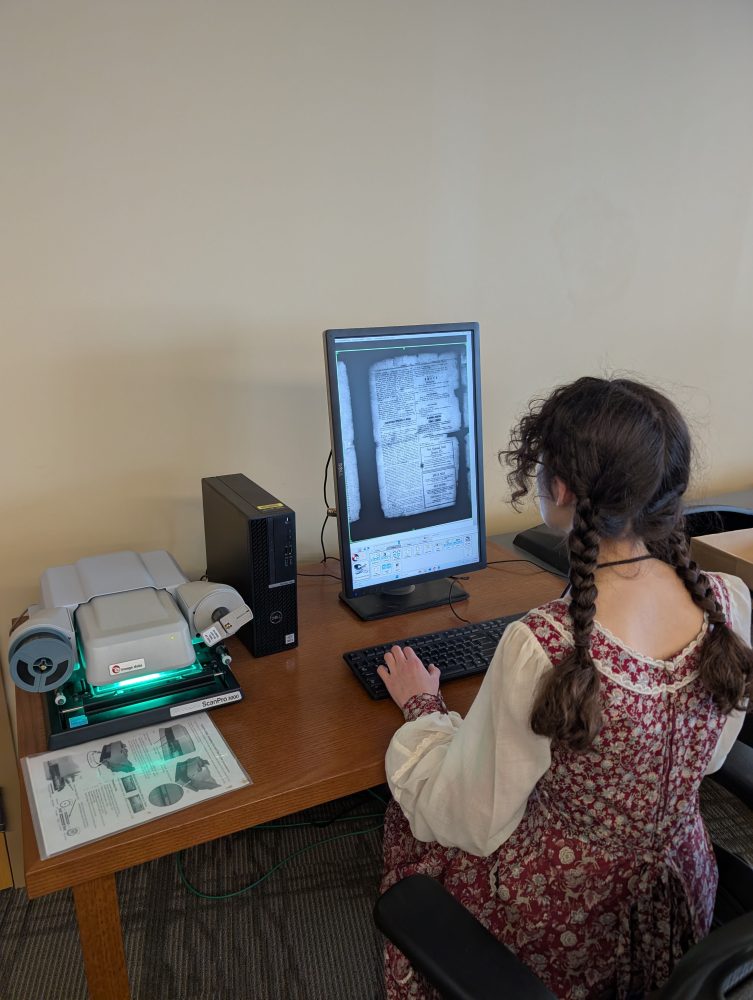 Person using microfilm