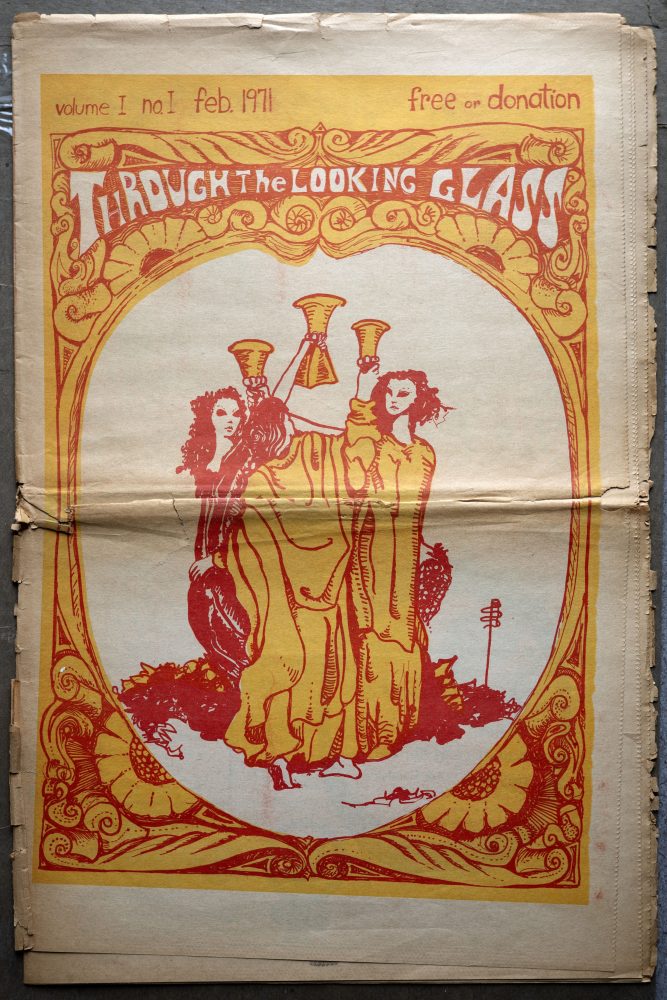 Three women with raised glasses